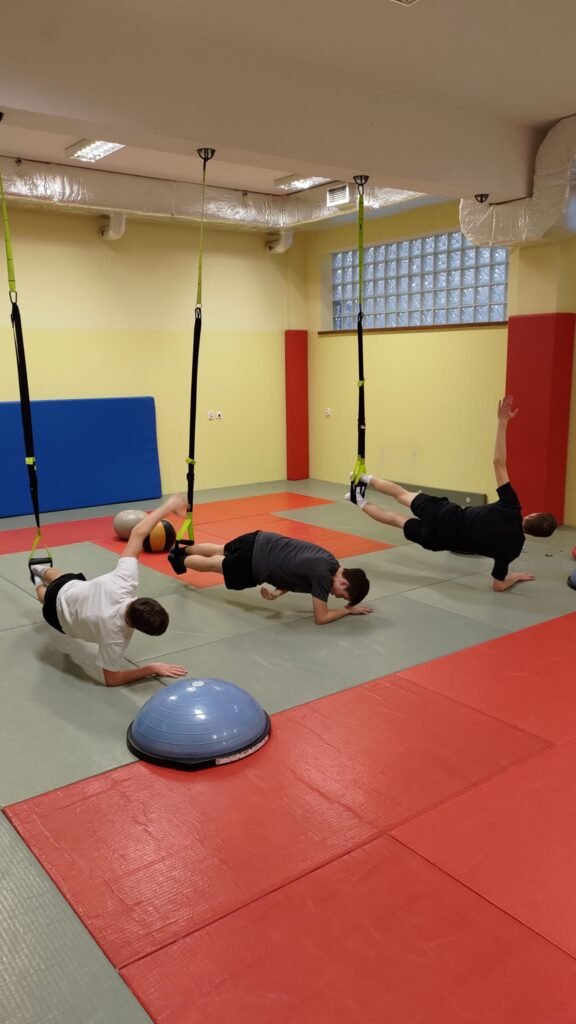 May be an image of 4 people and people practicing yoga